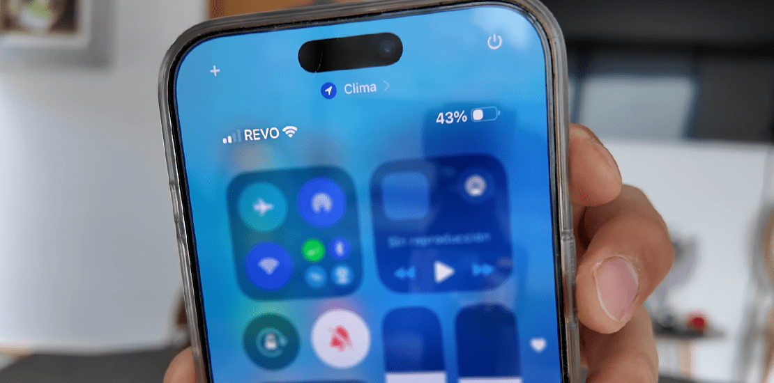 A close-up of a smartphone screen showing "REVO" as the mobile network carrier name.